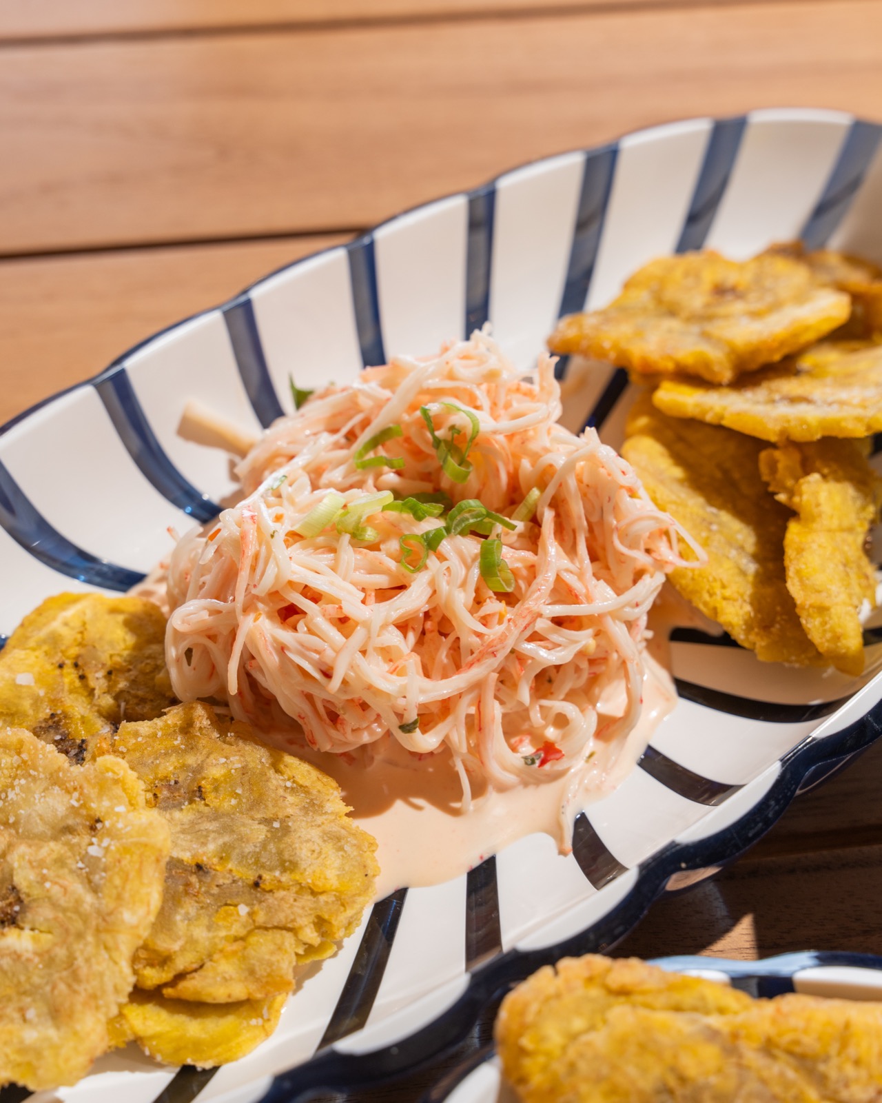 Crab salad and tostones served at Vivo Beach Club