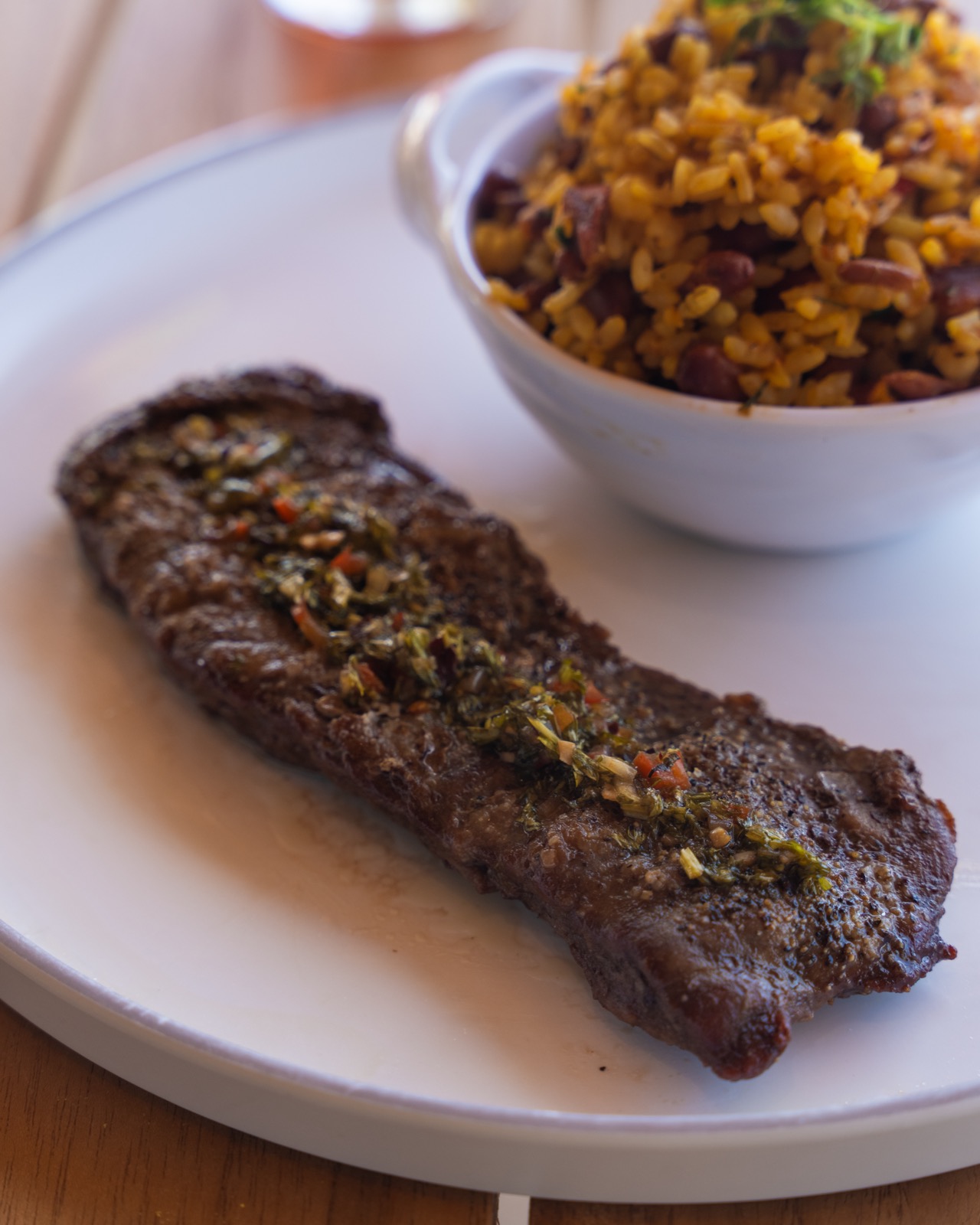 Grilled steak and rice served at Vivo Beach Club