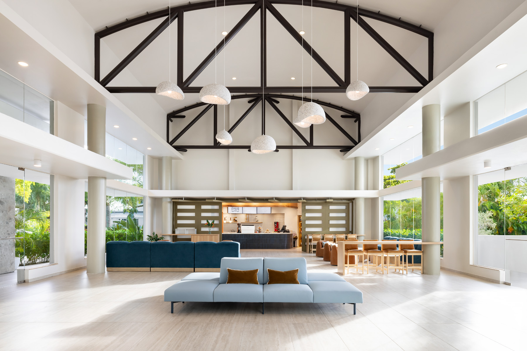 Bright Hyatt Centric San Juan Isla Verde lobby with Espresso Lab and modern seating