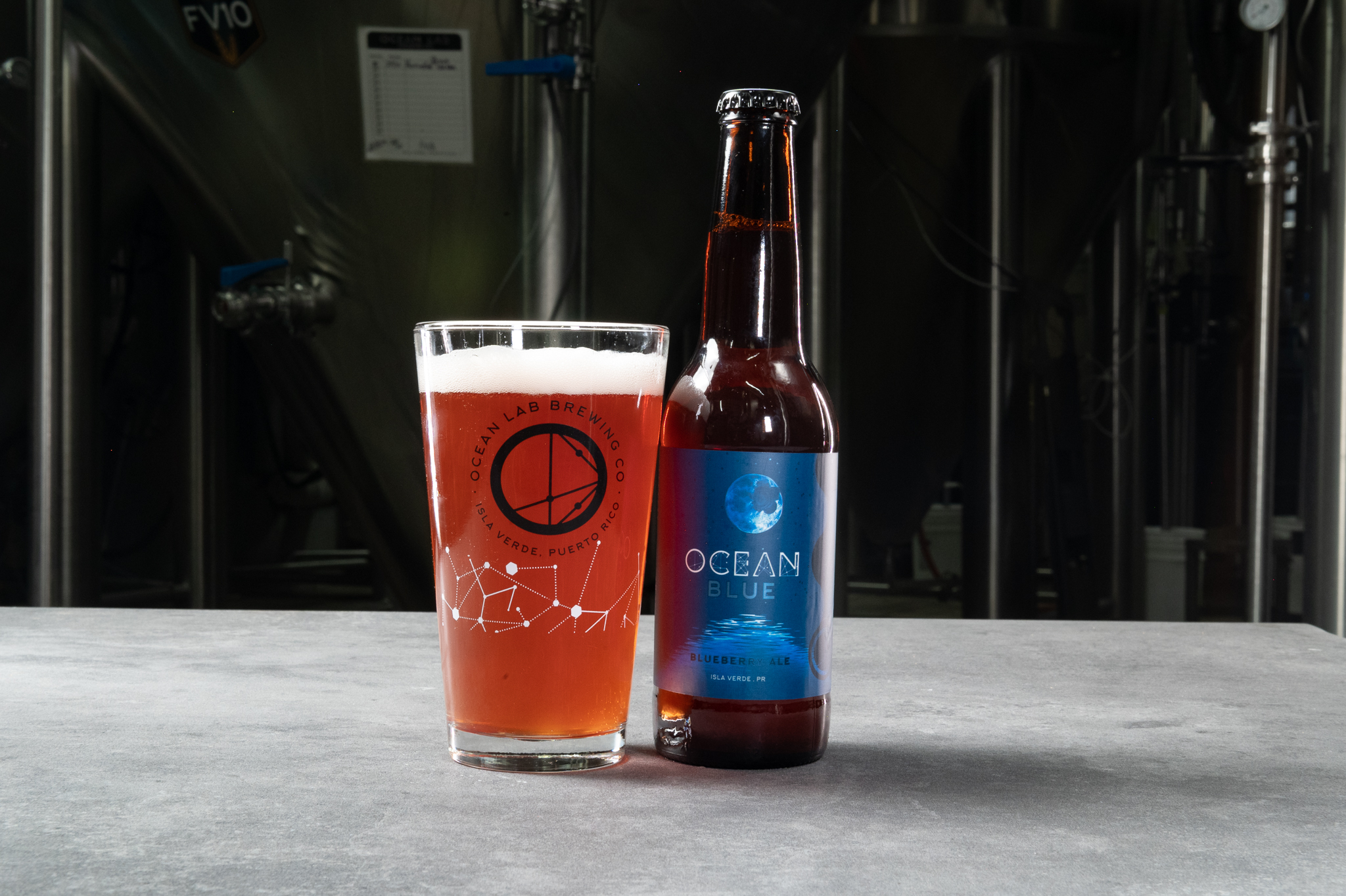 Ocean Lab Blue beer bottle and glass in the brewery