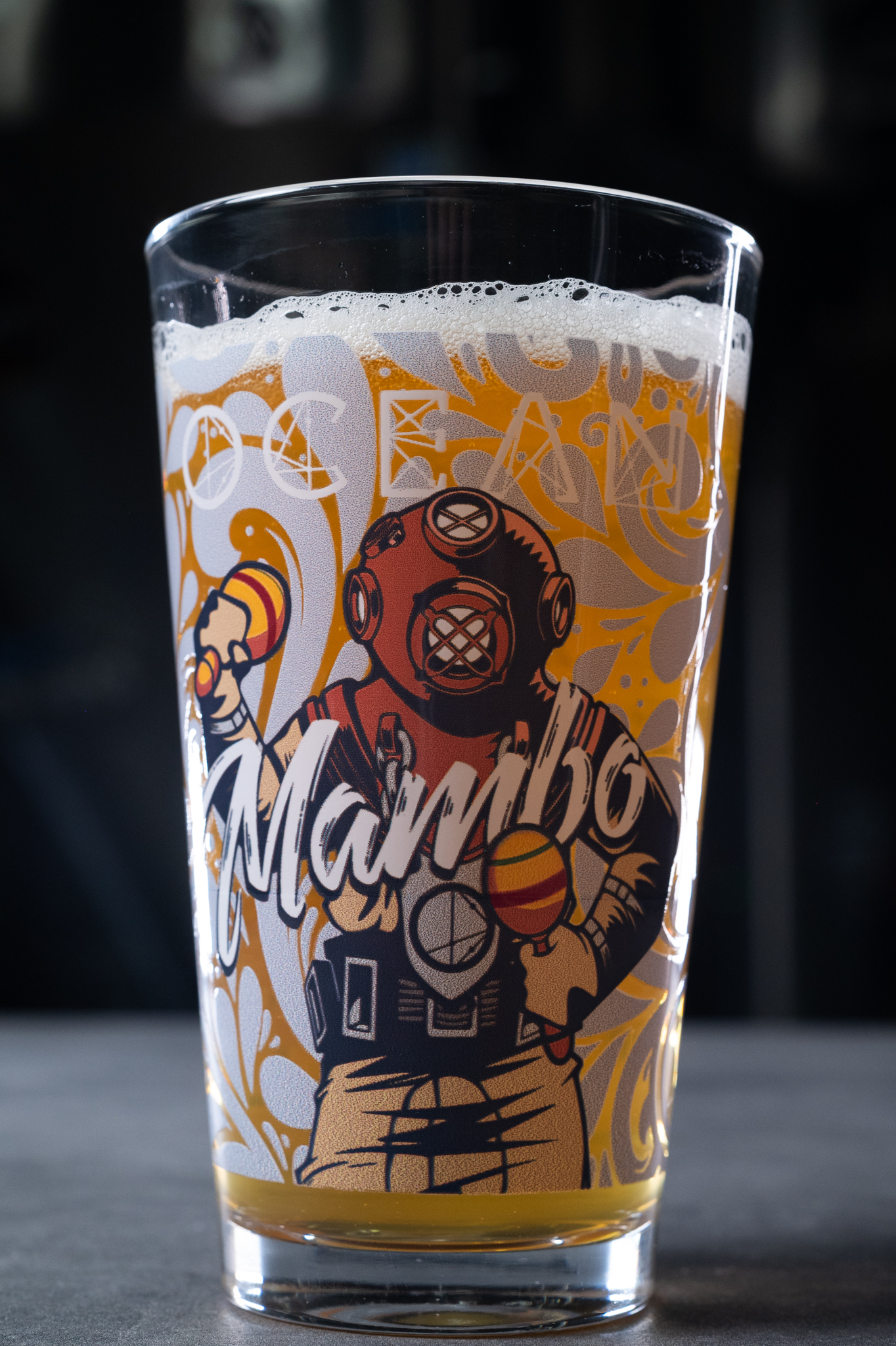 Ocean Lab Mambo beer glass close up with label artwork