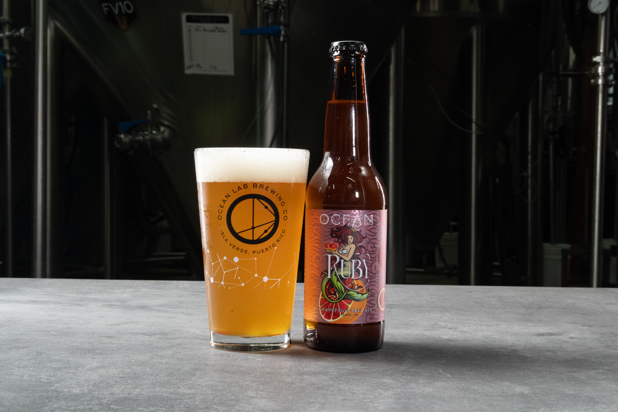 Ocean Lab Ruby grapefruit pale ale bottle and glass in the brewery